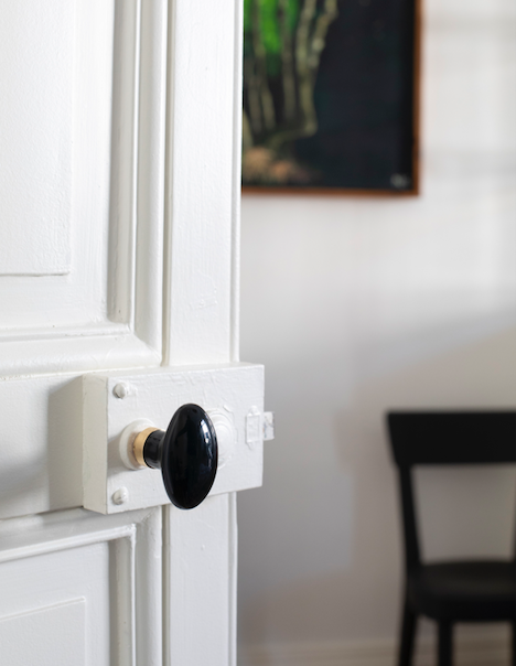 Bouton de porte ovale en porcelaine noir brillant