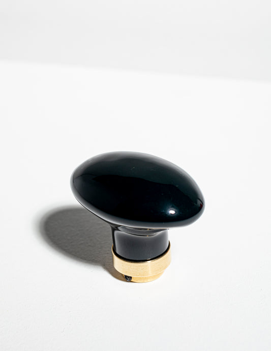 Bouton de porte ovale en porcelaine noir brillant