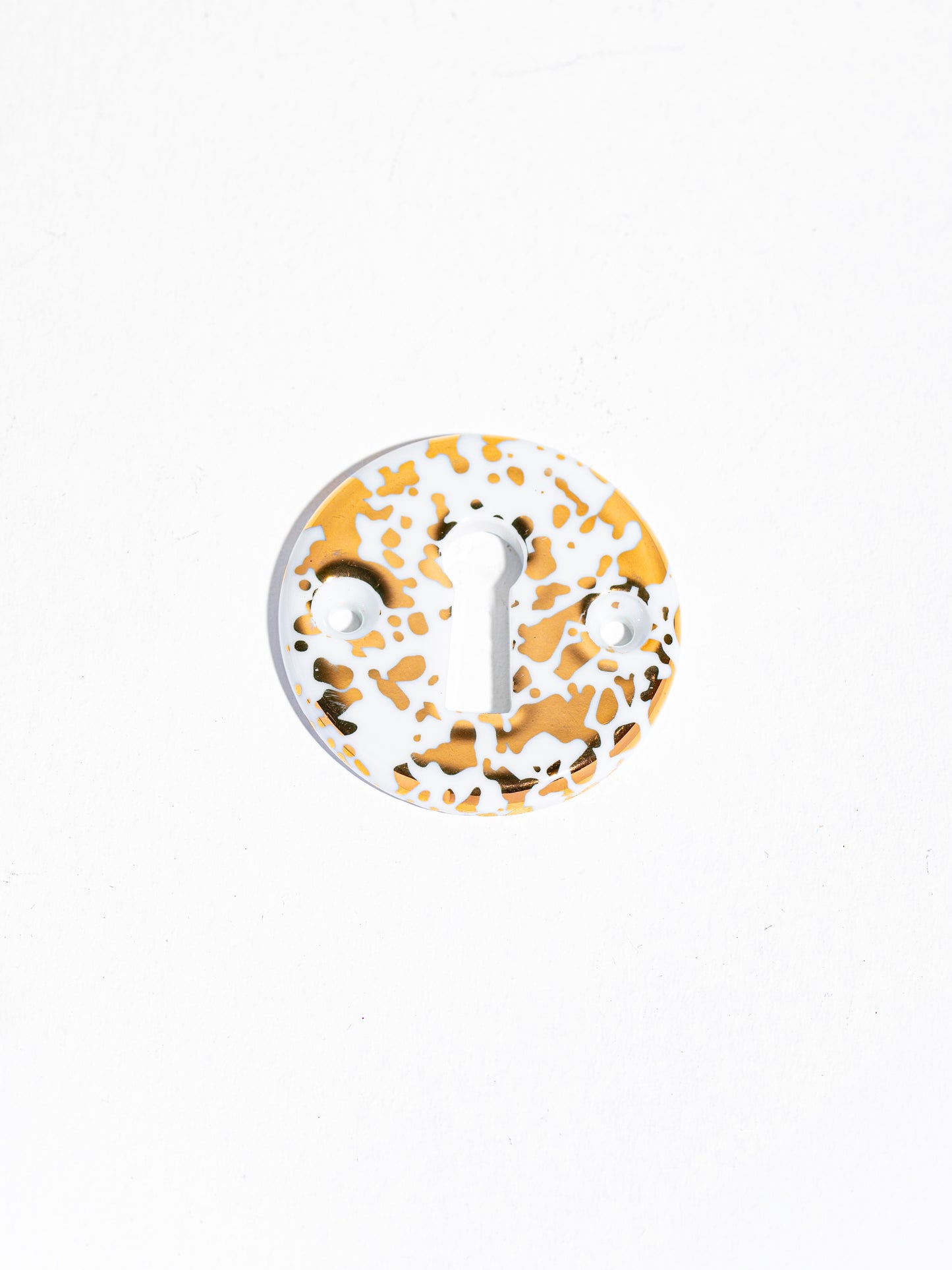 Bouton de porte ovale en porcelaine Meta Averse Platine et Or